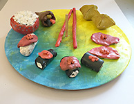 Plate of sculpted suchi